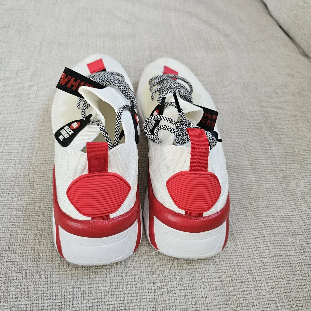 White Sneakers with Red and Black Accents